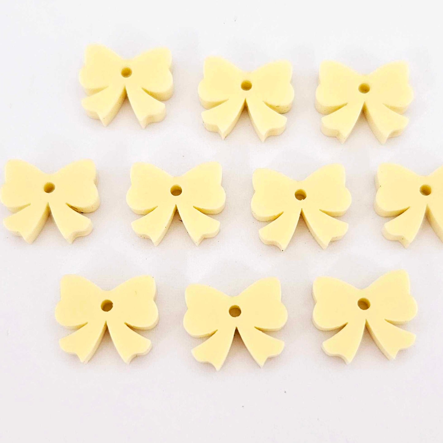 pastel yellow lemon bow accompaniments DIY earring supplies laser cut acrylic dangles Easter