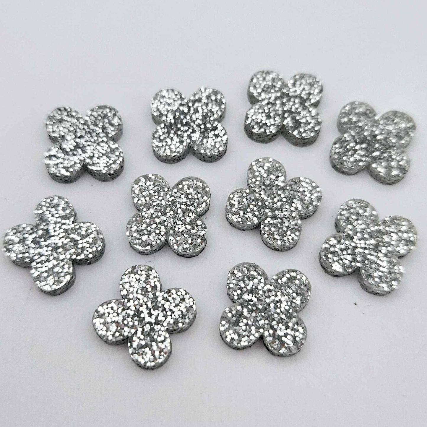 silver glitter quatrefoil earring blanks, clover acrylic studs, glitter acrylic earring toppers, acrylic earring supplies, laser cut earring blanks, 15mm acrylic shapes, modern jewellery supplies, on-trend earring blanks, DIY earring parts, small business jewellery making