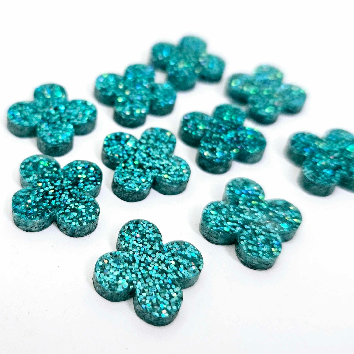 teal turquoise glitter quatrefoil earring blanks, clover acrylic studs, glitter acrylic earring toppers, acrylic earring supplies, laser cut earring blanks, 15mm acrylic shapes, modern jewellery supplies, on-trend earring blanks, DIY earring parts, small business jewellery making