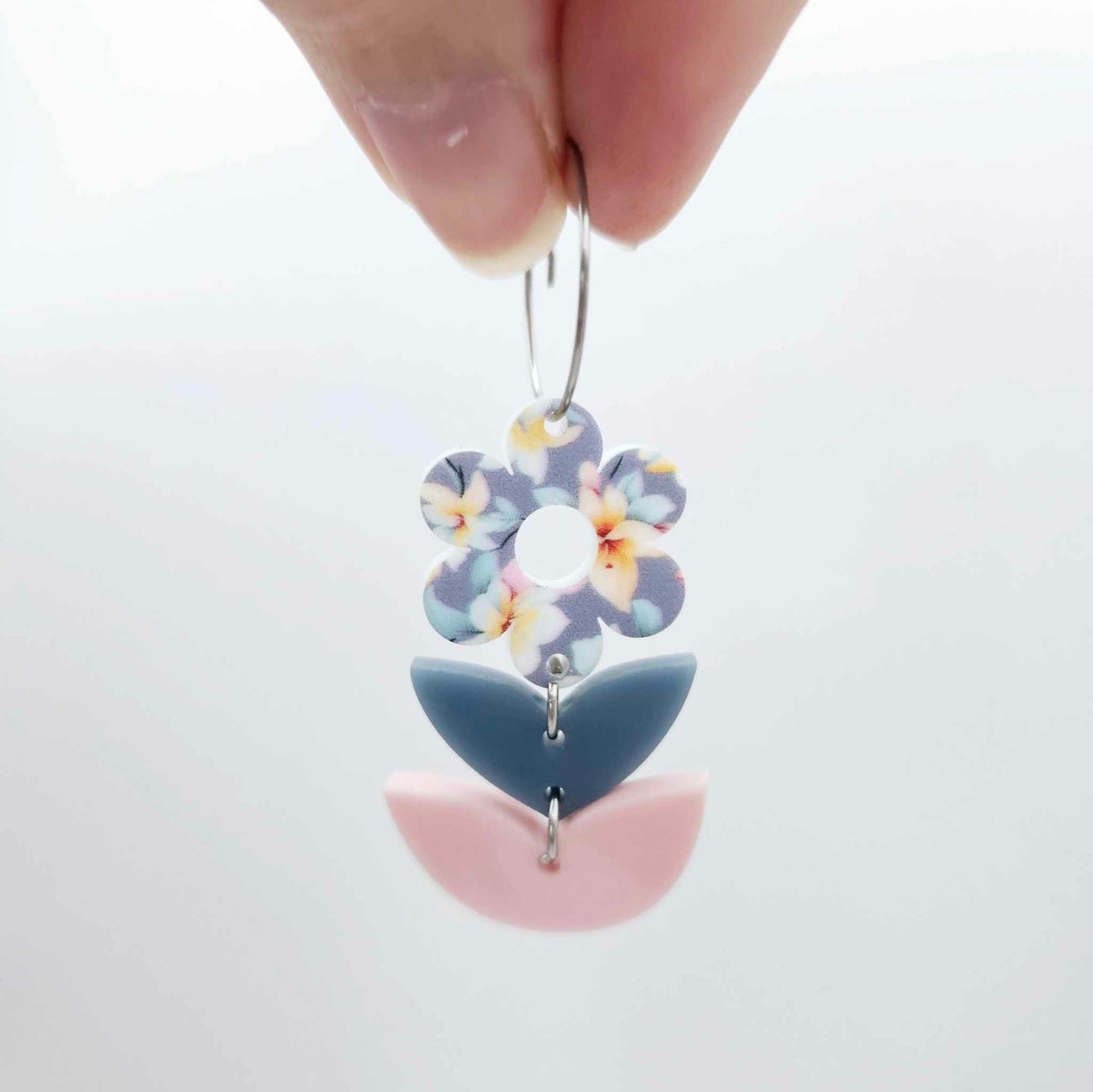 Assembled three-piece acrylic flower dangle hanging from a 20mm hoop, UV printed Hawaii Dream flower with bluestone and strawberry milkshake leaf layers
