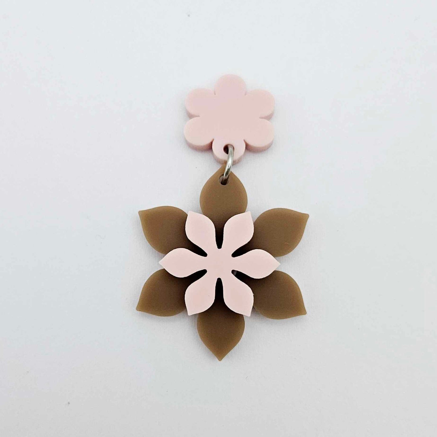 Layered iced coffee and strawberry milkshake flower dangle assembled and hanging from a strawberry milkshake flower topper, 3D two tone floral design