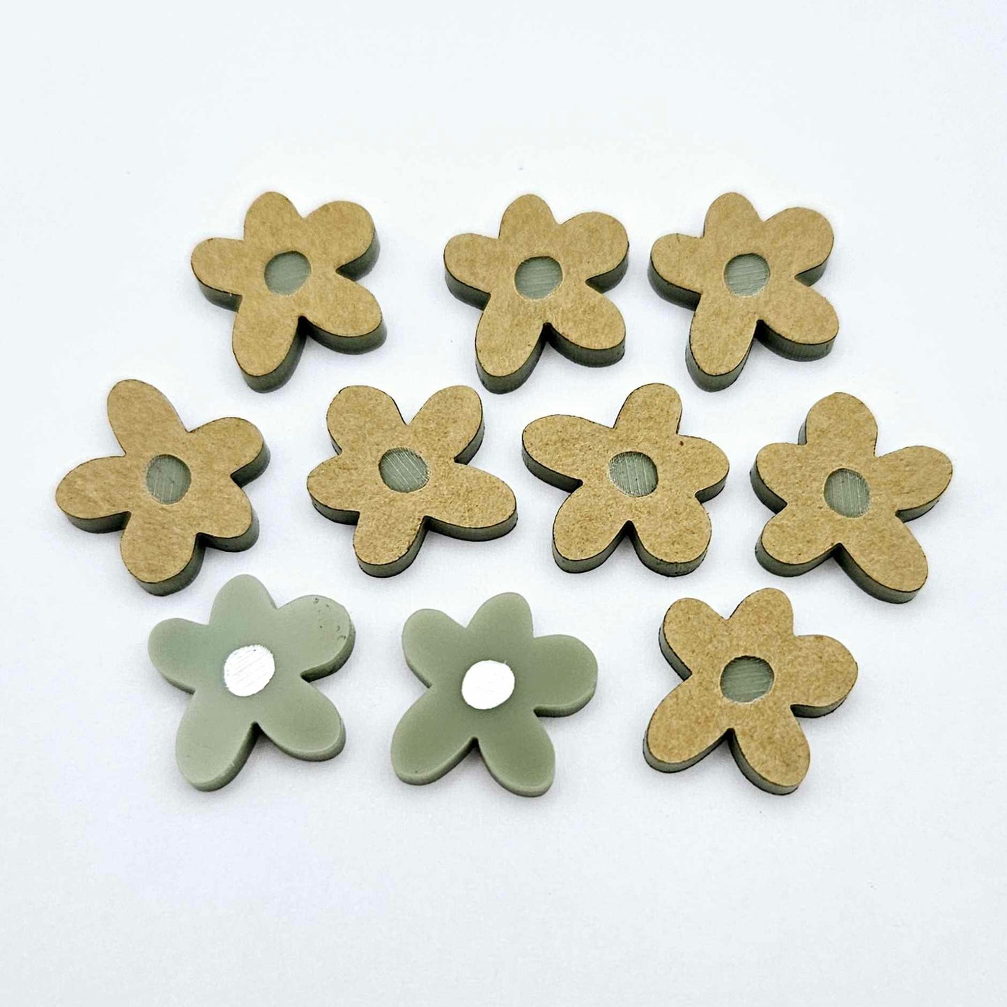 16mm Olive green organic flower stud blanks with engraved centre, one pair paint filled white and several unfilled pieces shown with protective film on