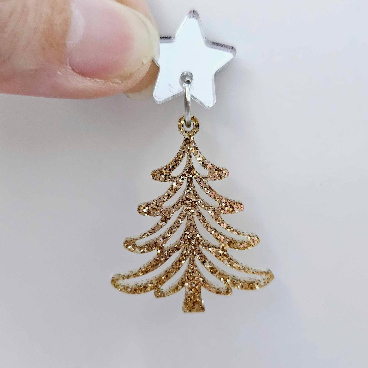 One 35mm rose gold glitter Cascade Christmas Tree dangle earring blank assembled with a 16mm star topper, shown as a finished earring component