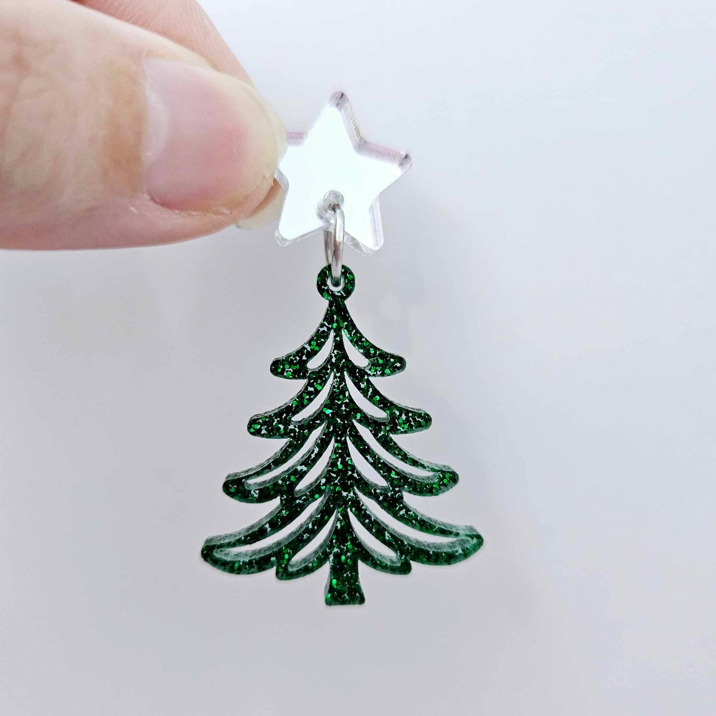 One 35mm green glitter Cascade Christmas Tree dangle earring blank assembled with a 16mm star topper, shown as a finished earring component