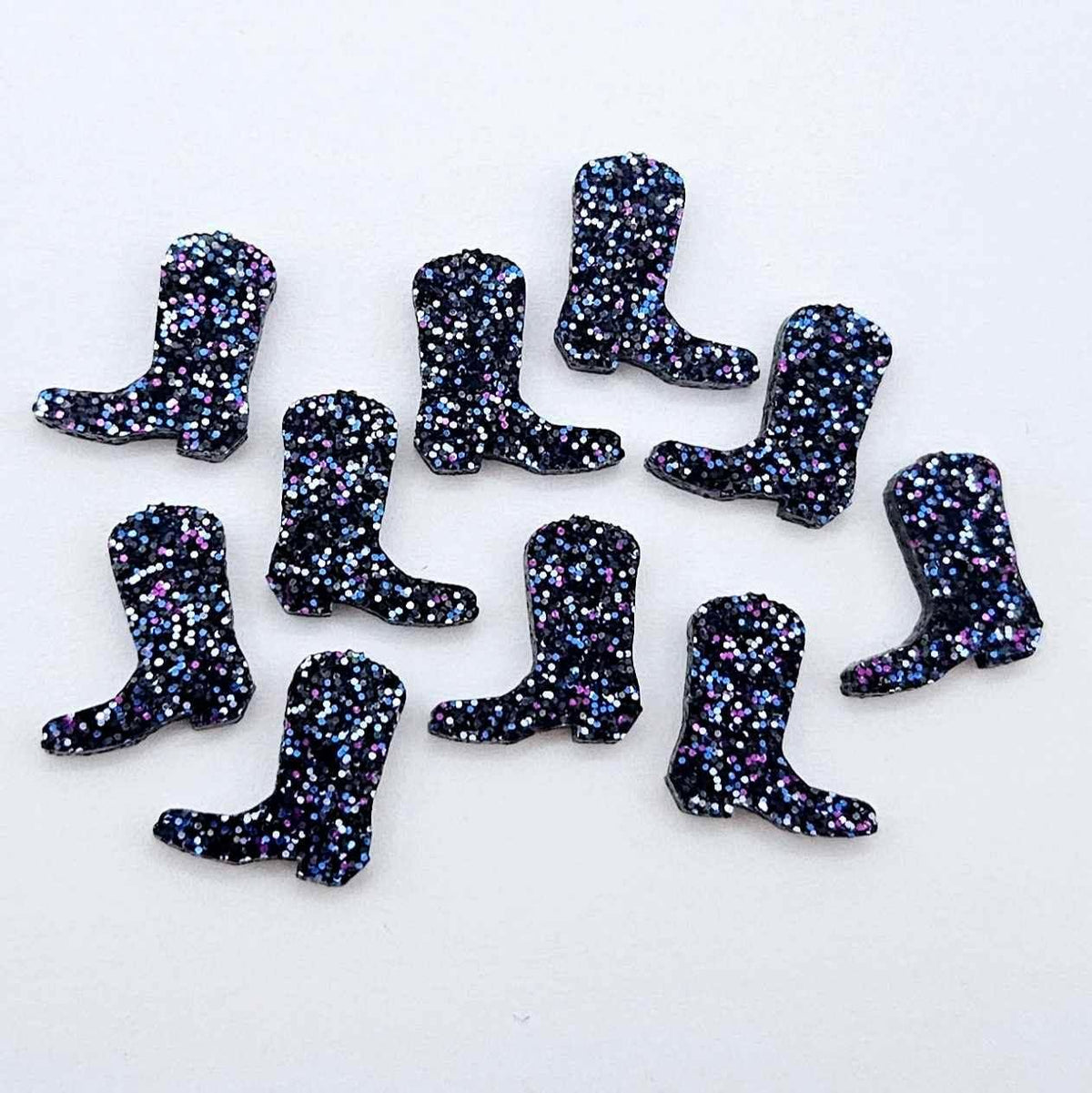 15mm holographic blue glitter boot stud earring blanks laid flat together.