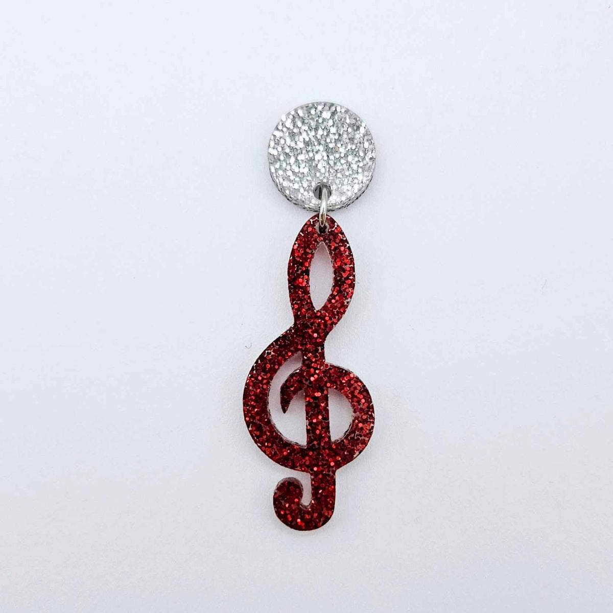 40mm red glitter treble clef earring dangle blank assembled with a 14mm silver glitter topper, showing how the pieces can be paired to create a finished music-inspired earring.