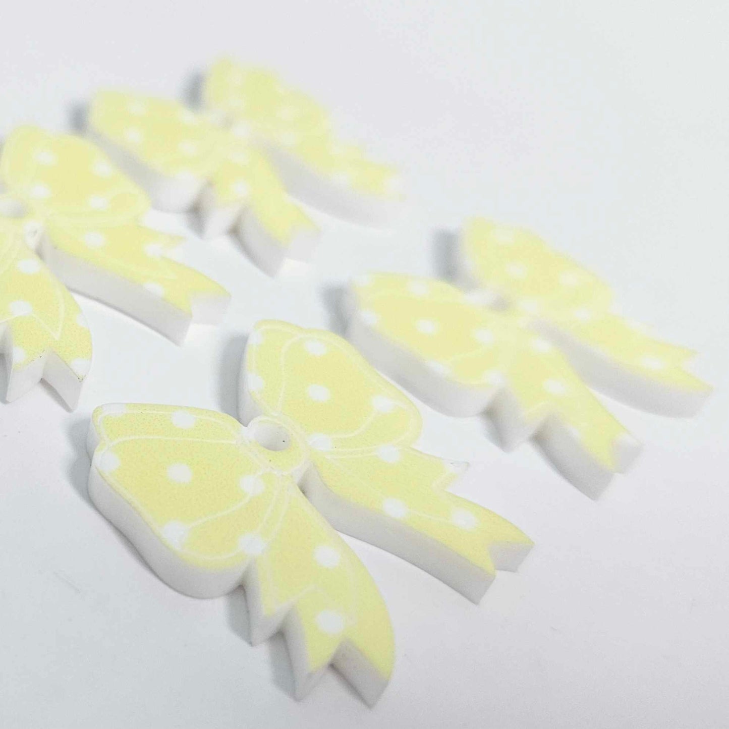 pastel yellow polka dot bows Valentines Day Easter Christmas ribbon DIY earring supplies laser cut acrylic dangles blanks