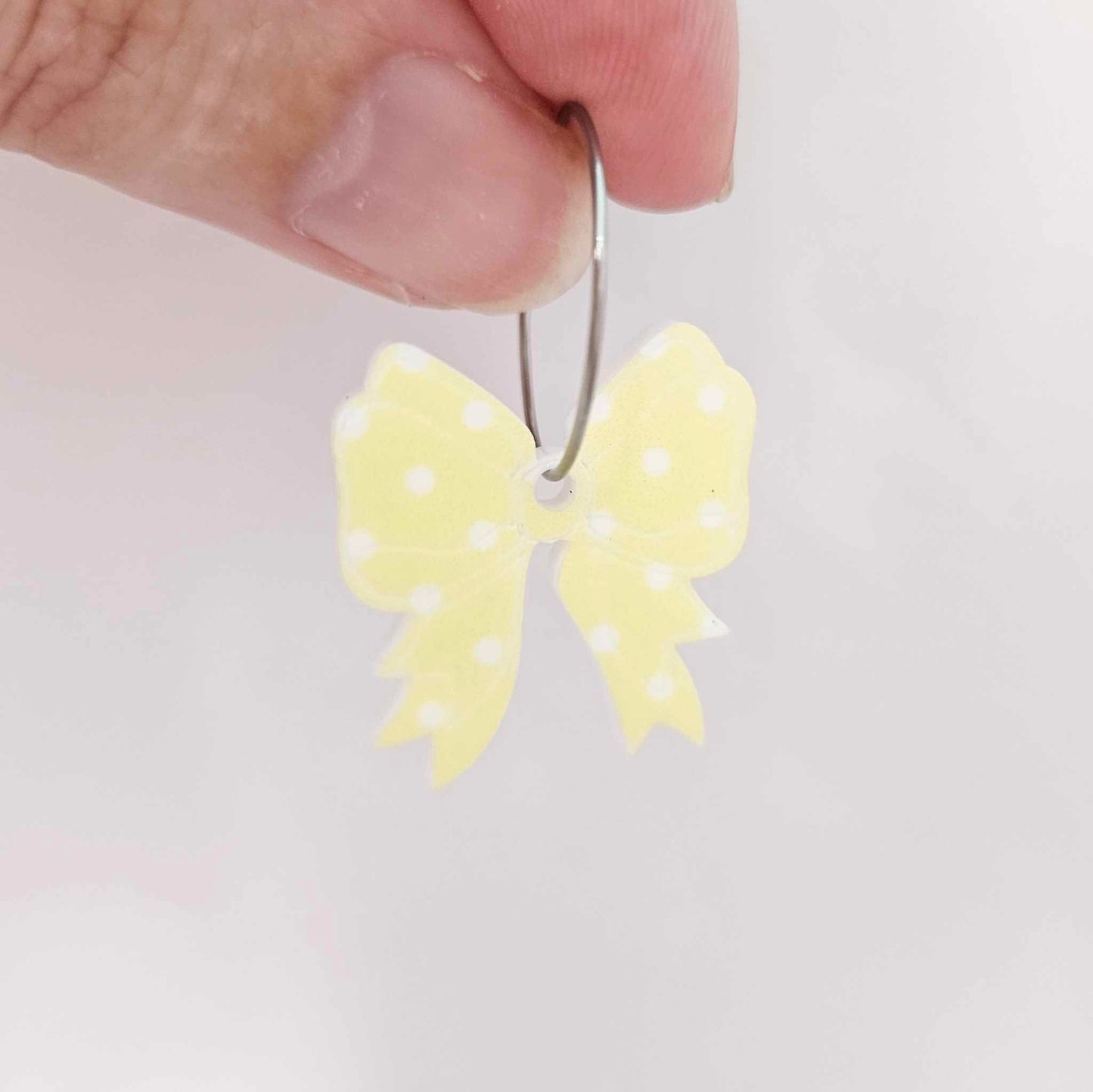 pastel yellow polka dot bows Valentines Day Easter Christmas ribbon DIY earring supplies laser cut acrylic dangles blanks