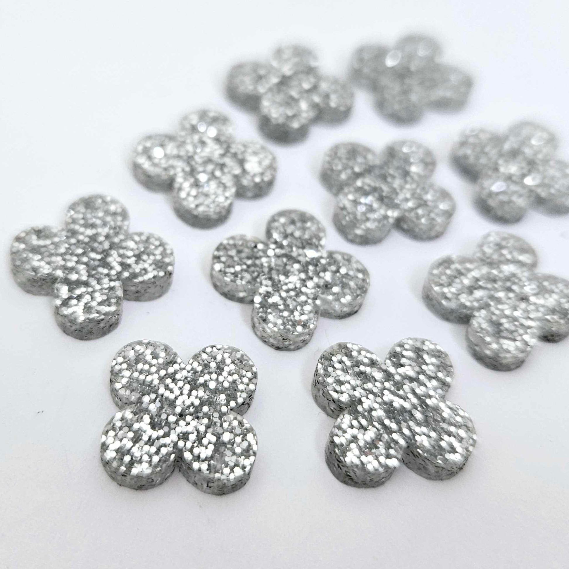 silver glitter quatrefoil earring blanks, clover acrylic studs, glitter acrylic earring toppers, acrylic earring supplies, laser cut earring blanks, 15mm acrylic shapes, modern jewellery supplies, on-trend earring blanks, DIY earring parts, small business jewellery making