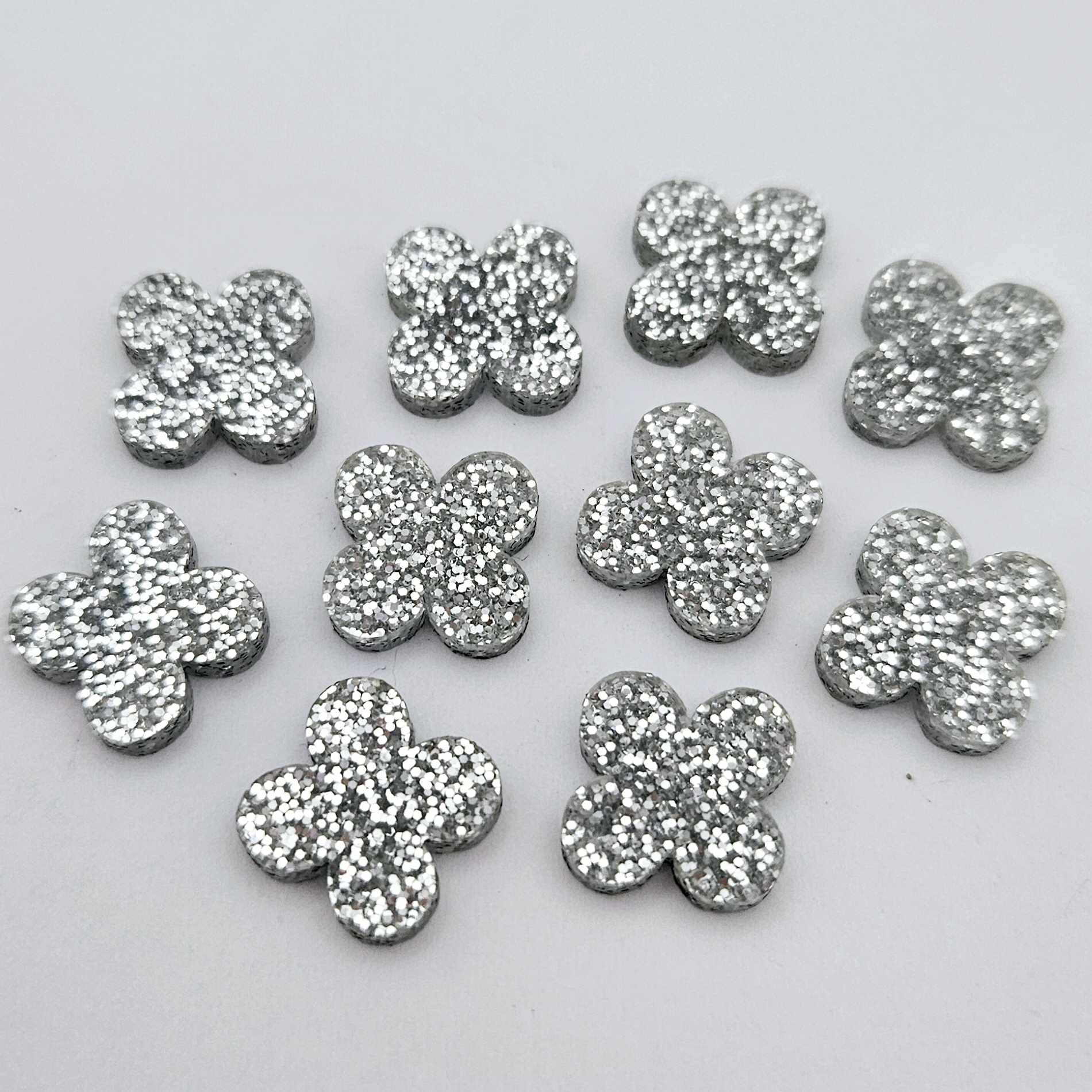 silver glitter quatrefoil earring blanks, clover acrylic studs, glitter acrylic earring toppers, acrylic earring supplies, laser cut earring blanks, 15mm acrylic shapes, modern jewellery supplies, on-trend earring blanks, DIY earring parts, small business jewellery making