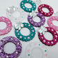 hot pink purple teal fairy dust clear silver glitter wreath Christmas Xmas bows DIY earring supplies laser cut acrylic dangles blanks engraved paint filled baubles layered hoops mixed pack