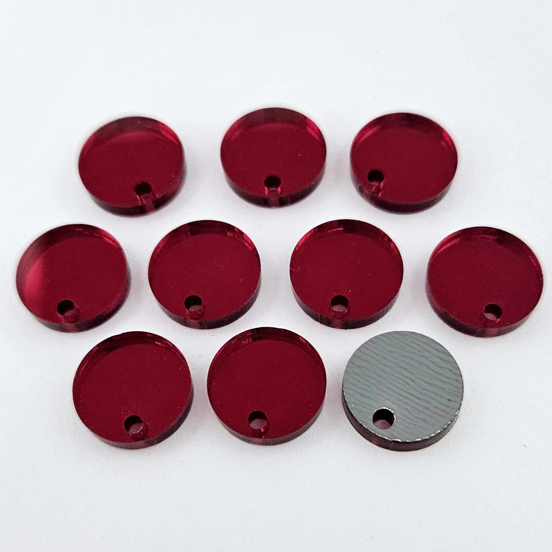 14mm red mirror acrylic topper showing reflective finish and grey backing