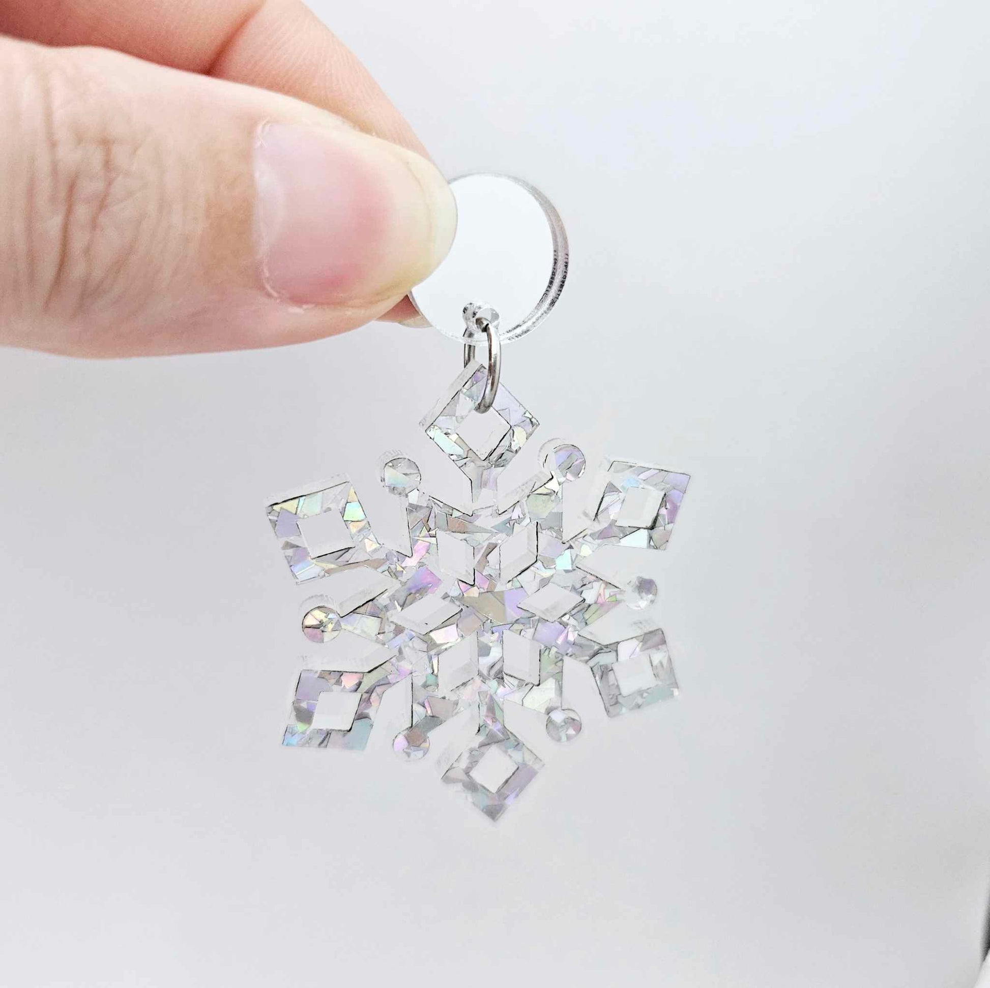 silver mirror earring toppers paired with Christmas snowflake dangles for festive earrings