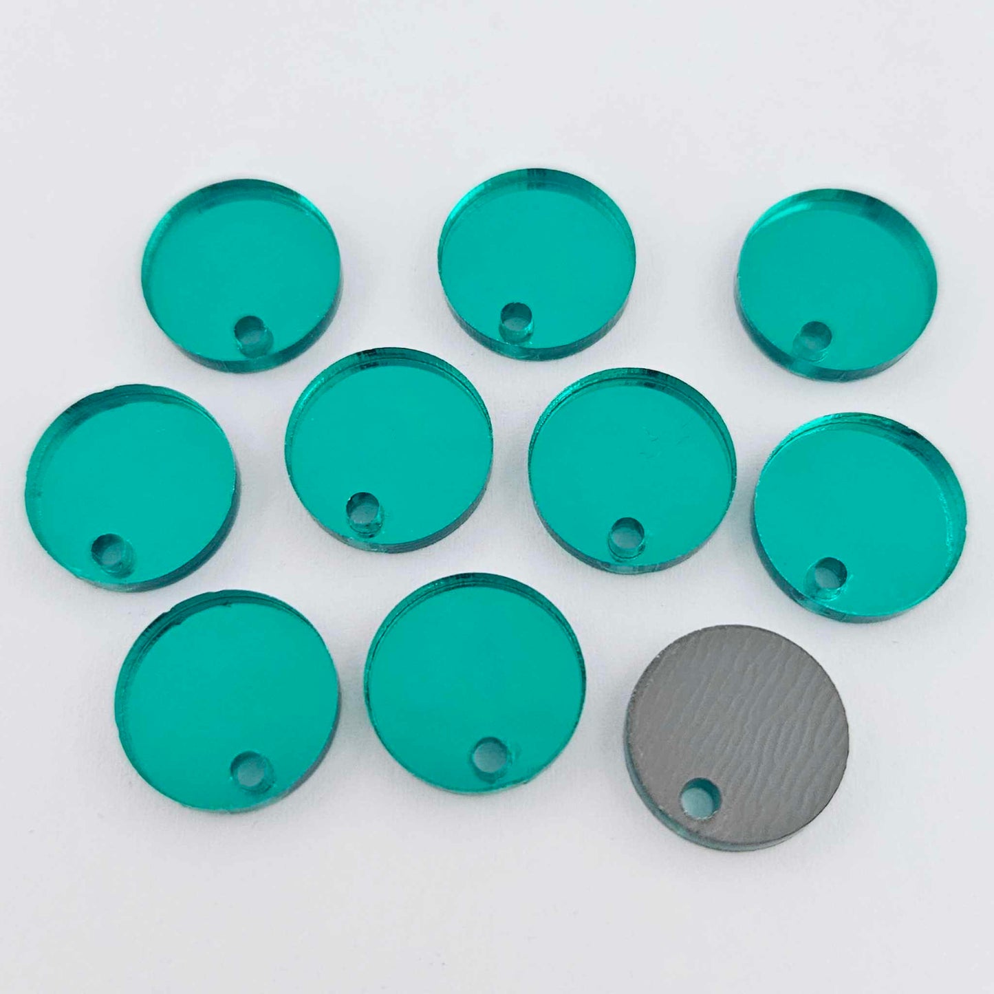 14mm green mirror acrylic topper showing reflective finish and grey backing