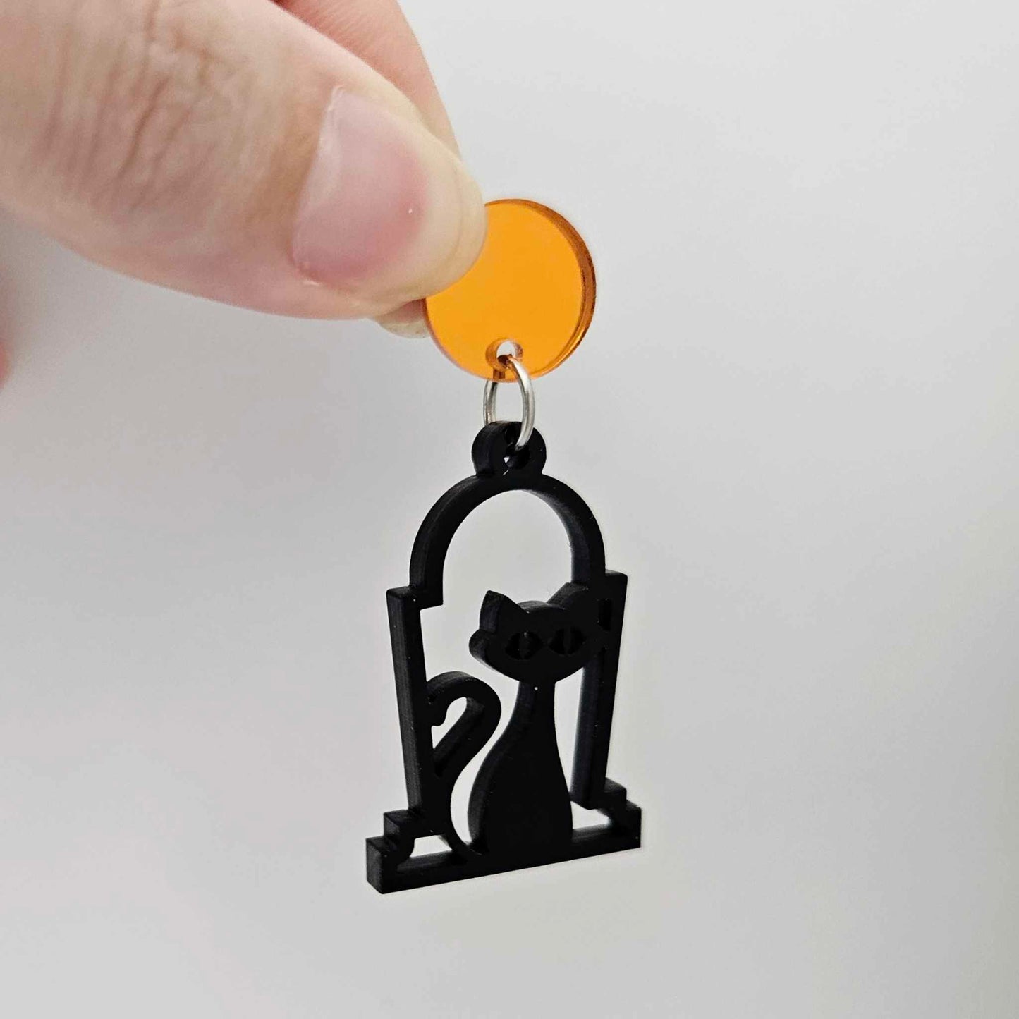 orange mirror earring toppers paired with black cat on tombstone dangles