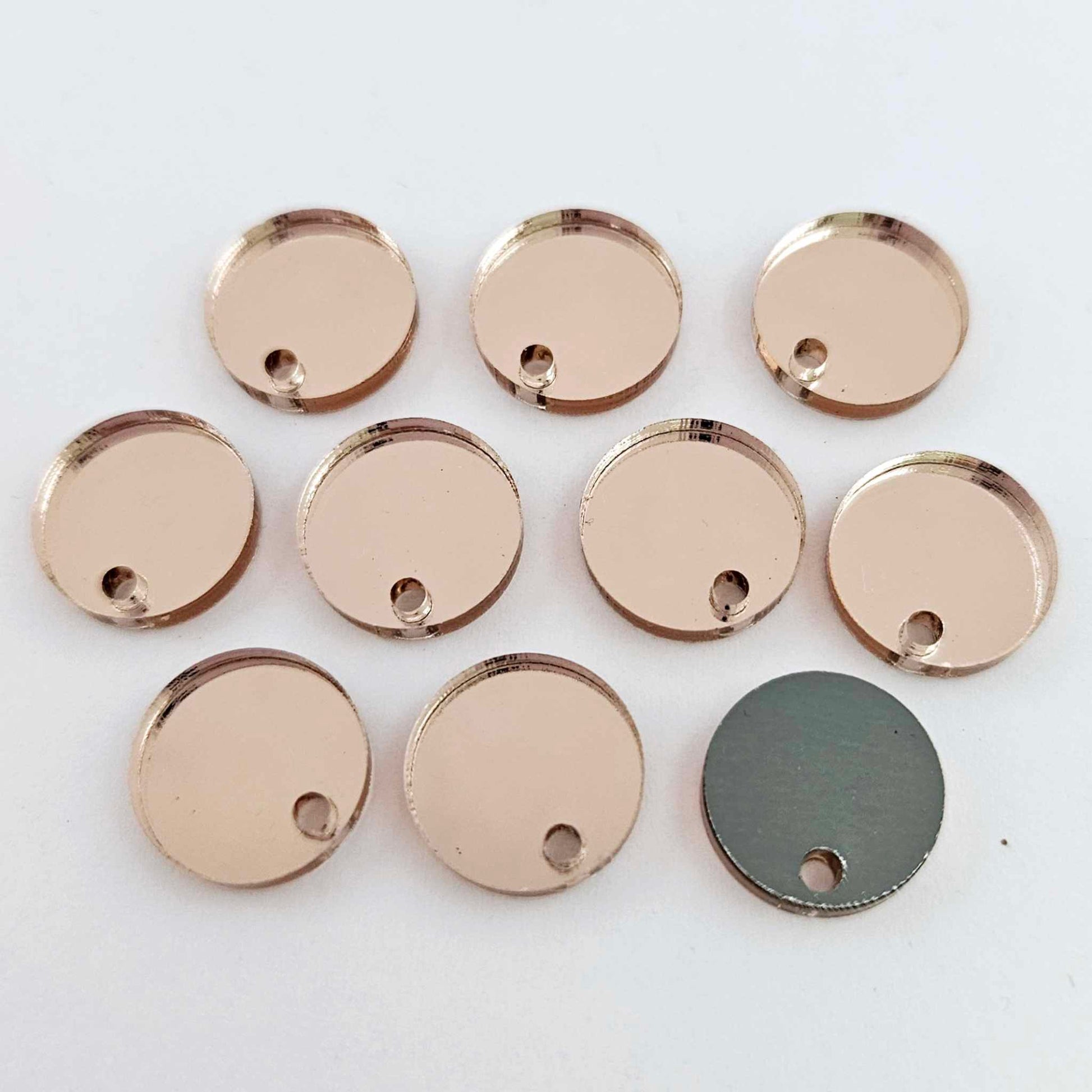 14mm rose gold mirror acrylic topper showing reflective finish and grey backing