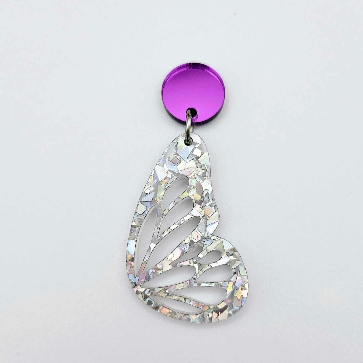 purple mirror earring toppers paired with silver glitter butterfly wing dangles