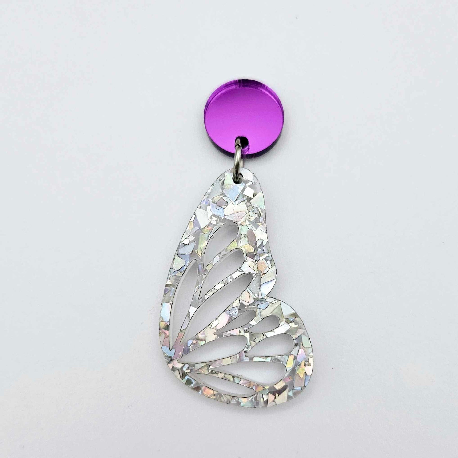 purple mirror earring toppers paired with silver glitter butterfly wing dangles