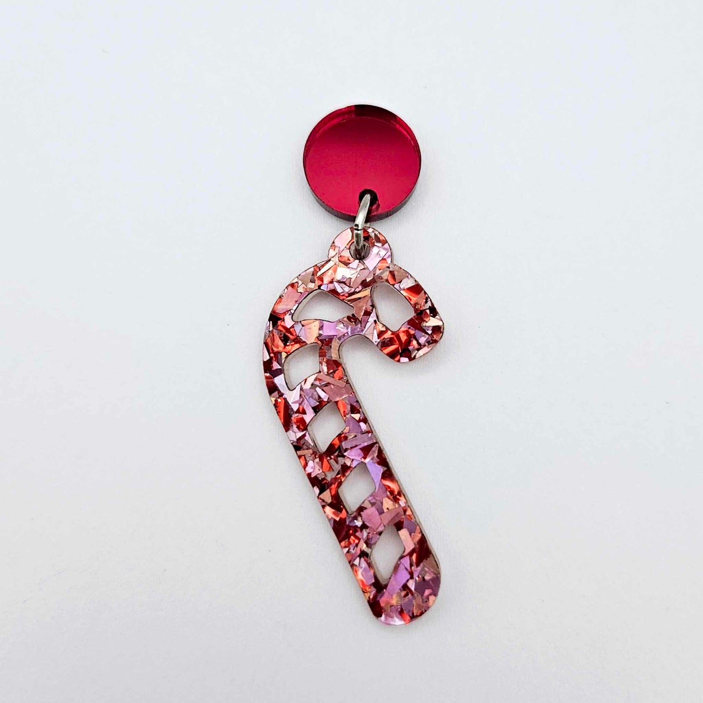 red mirror earring toppers paired with Christmas candy cane dangles for festive earrings