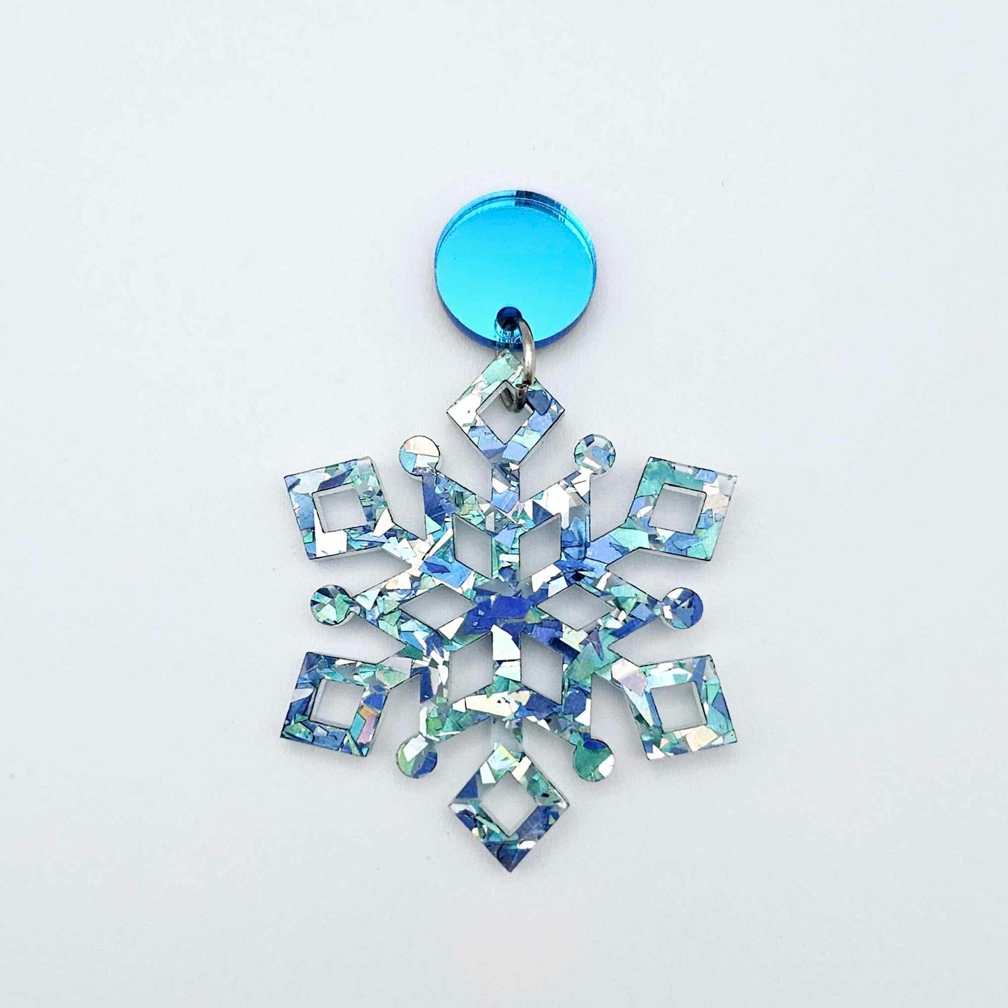 blue mirror earring toppers paired with blue/silver glitter snowflake dangles