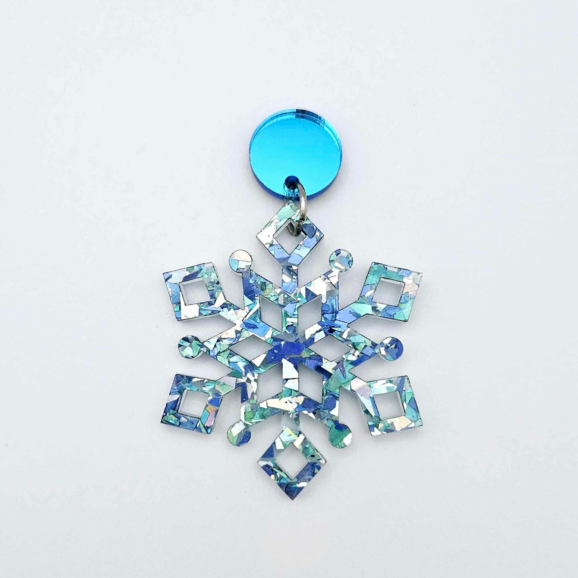 blue mirror earring toppers paired with blue/silver glitter snowflake dangles