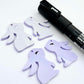 32mm pastel purple bunny dangle blanks showing paint filled black eyelashes on two pieces, with remaining pieces shown with protective paper as supplied