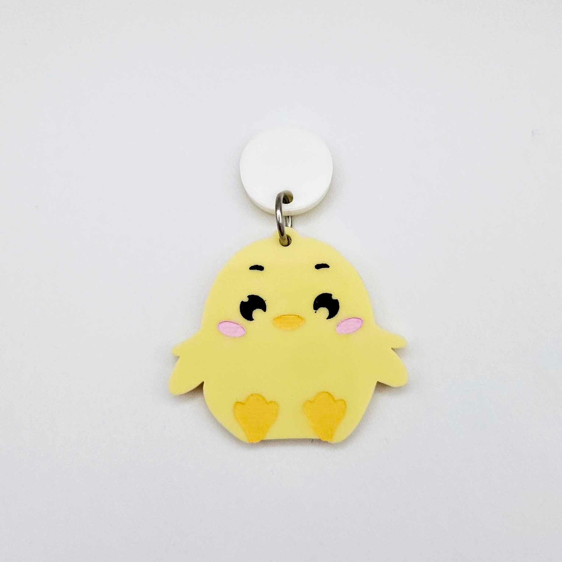 Pastel yellow acrylic chicken dangle hanging from a 14mm white acrylic topper, engraved chicken face with rosy cheeks paint filled
