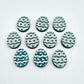 16mm teal glitter acrylic Easter egg stud blanks with engraved pattern and paint fill