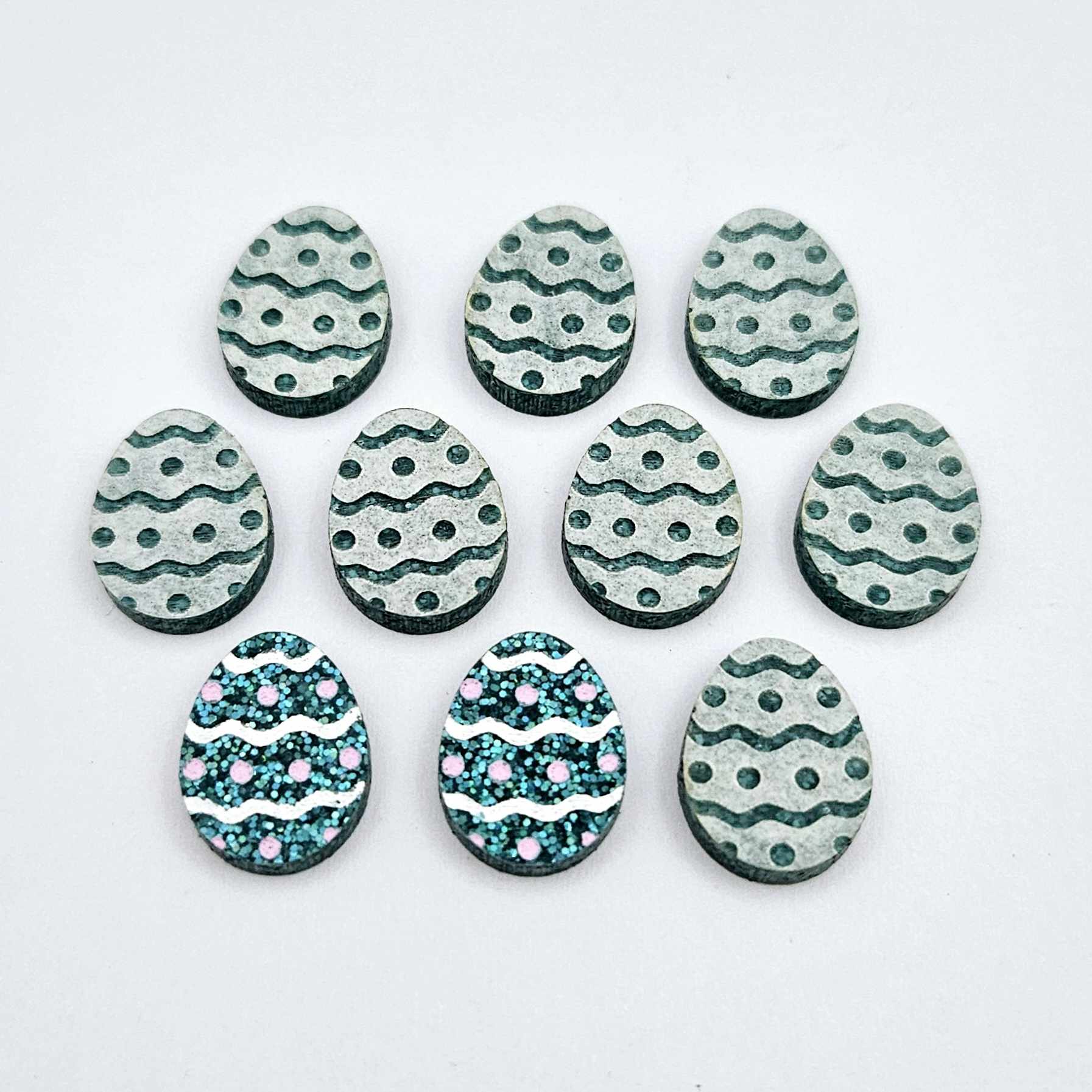 16mm teal glitter acrylic Easter egg stud blanks with engraved pattern and paint fill