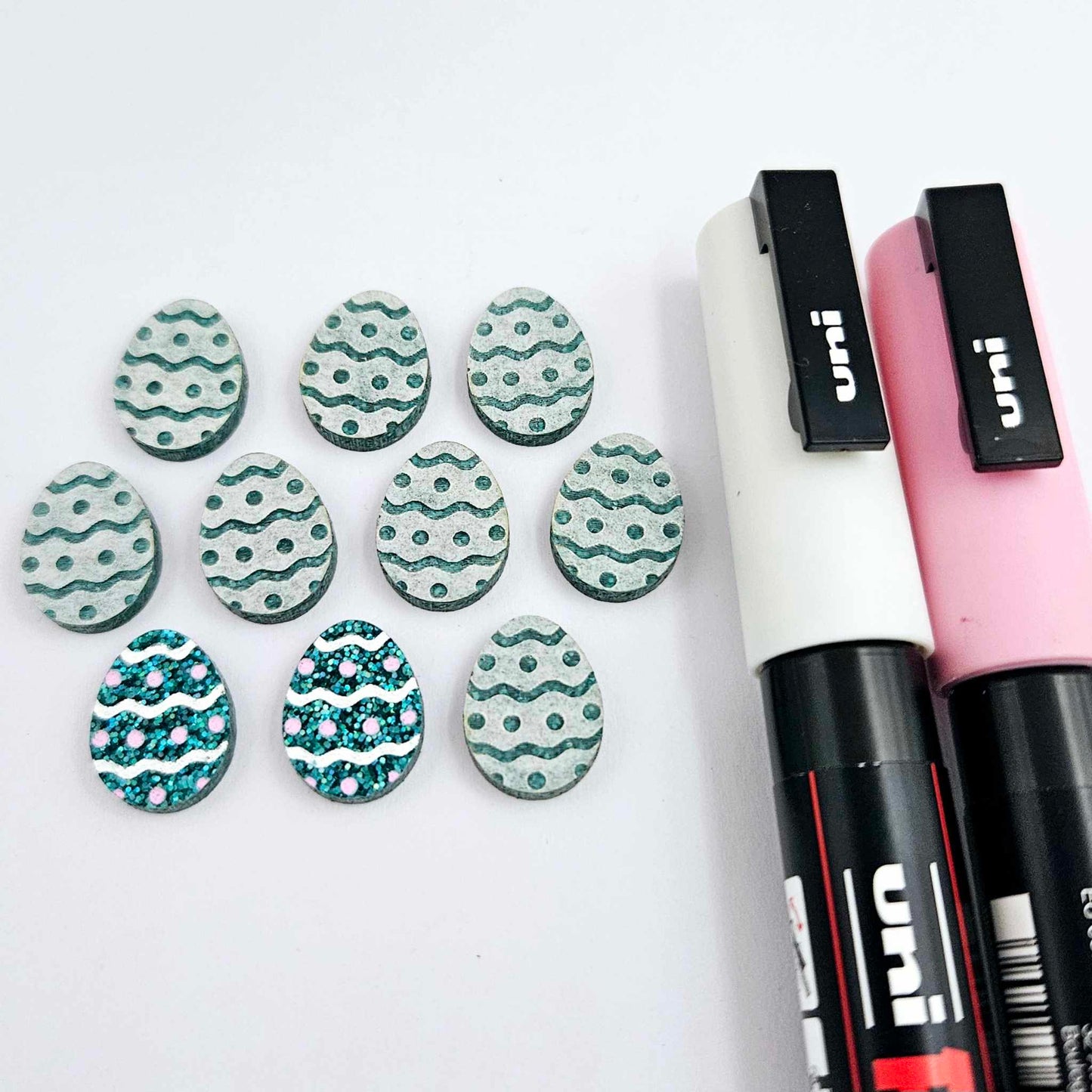16mm teal glitter acrylic Easter egg stud blanks with engraved pattern and paint fill