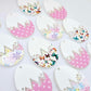 A mixture of cracked egg acrylic earring blanks unassembled, white top halves and different UV printed bottom halves