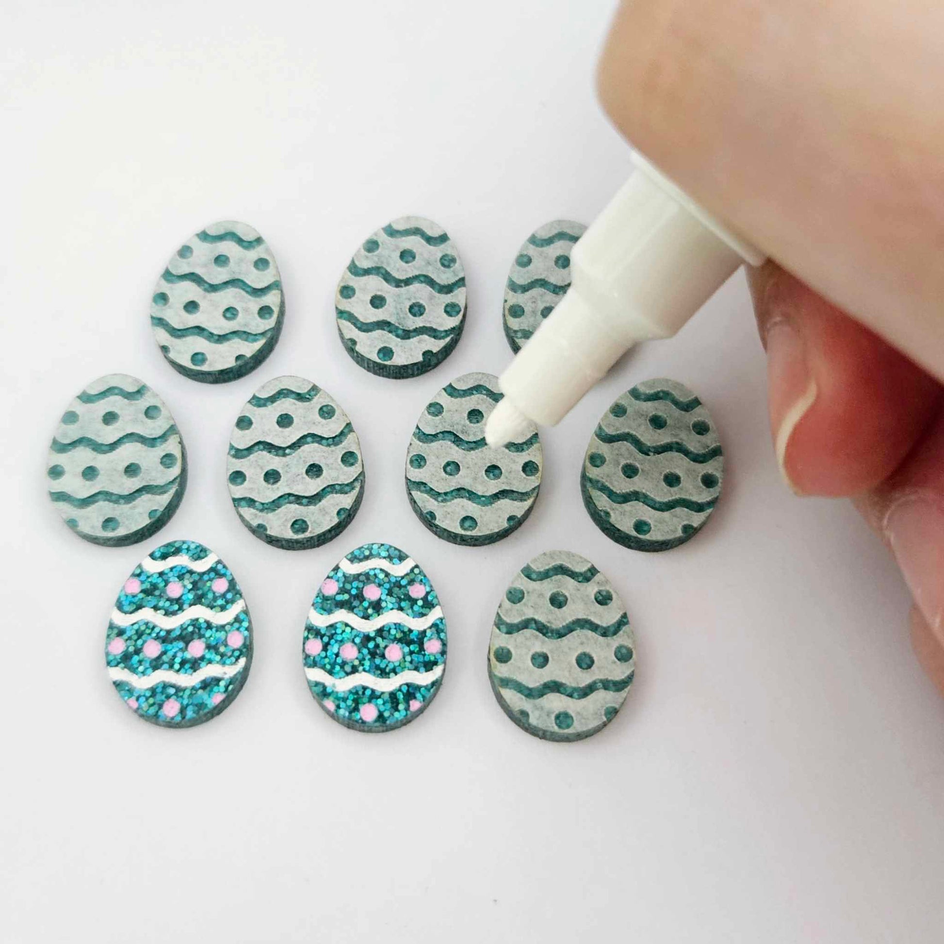 16mm teal glitter acrylic Easter egg stud blanks with engraved pattern and paint fill