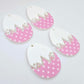 Four cracked egg earring blanks unassembled, white top halves and pastel pink polka dot UV printed bottom halves