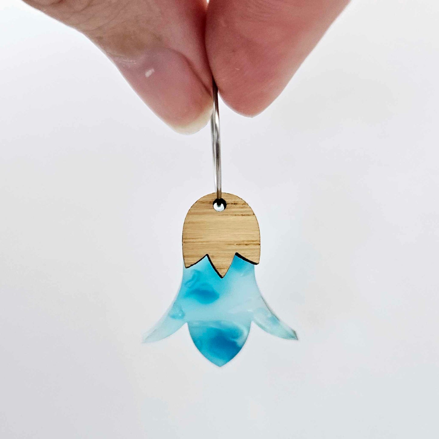 Periwinkle petal acrylic nodding flower dangle blanks assembled on 20mm hoops with leaf cap detail for a layered botanical flower look
