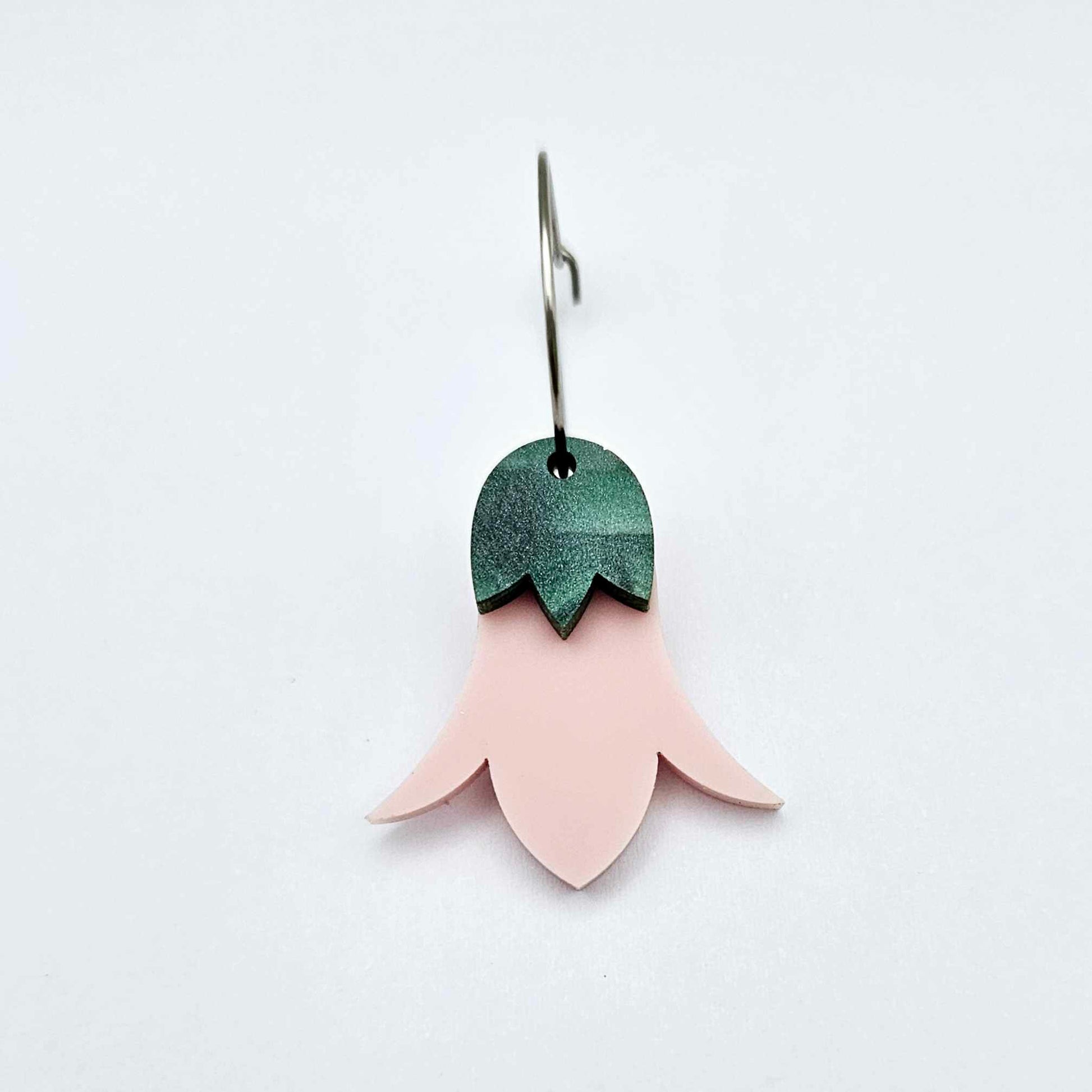 Dusty pale pink nodding flower dangles assembled on 20mm hoops with leaf cap detail for a layered botanical flower look