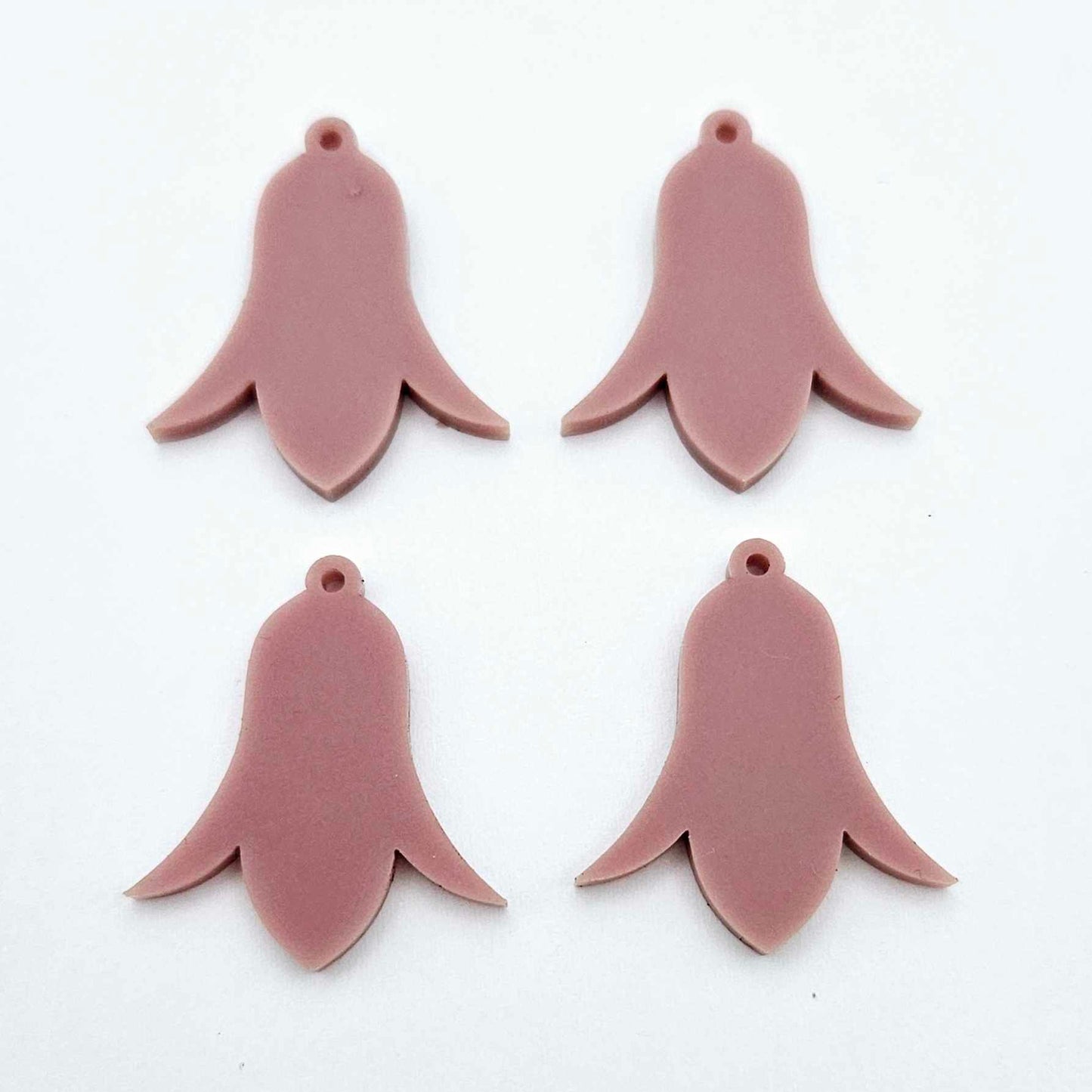 28mm dusty rose acrylic nodding flower dangle blanks shown on their own