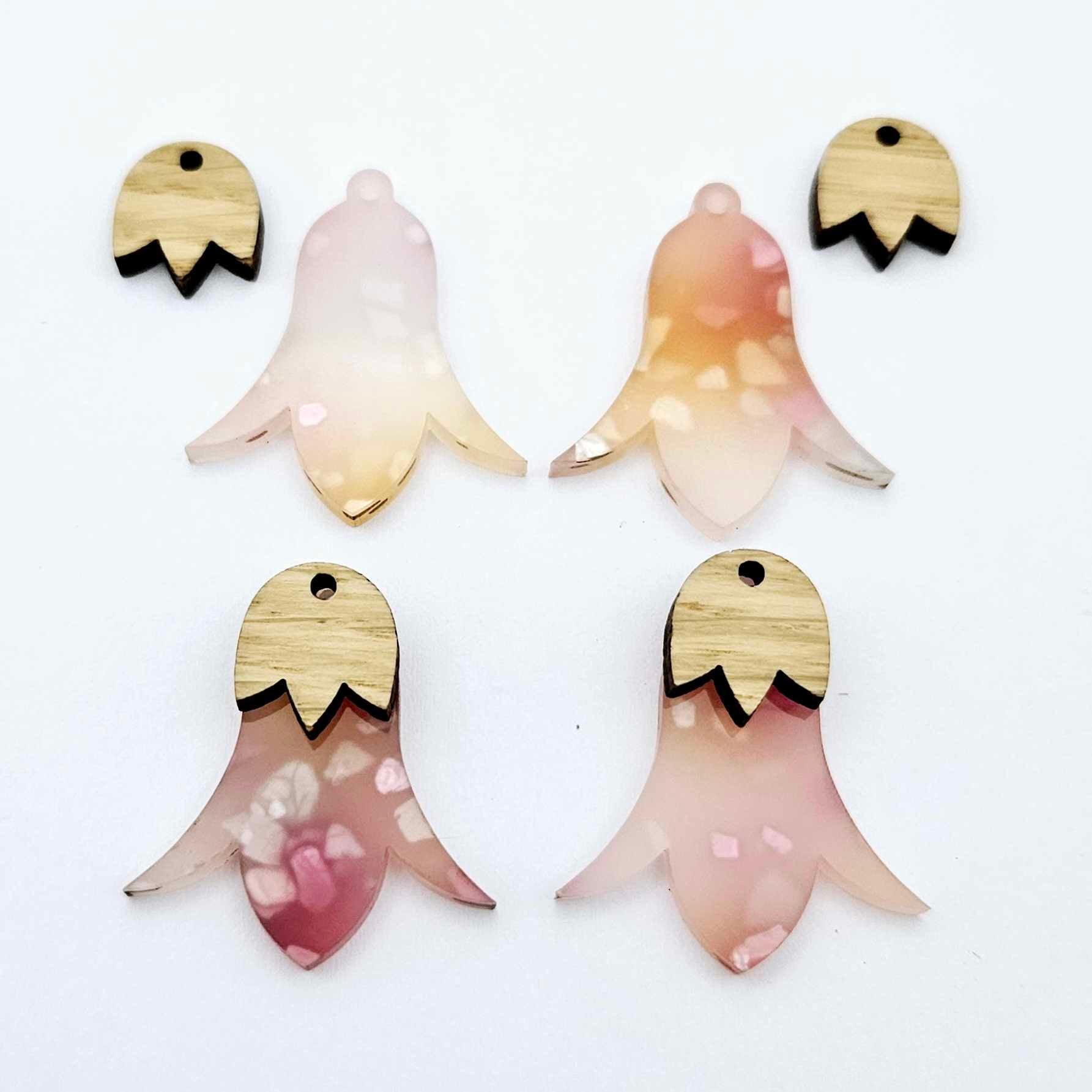 28mm frangipani petal acrylic nodding flower dangle blanks shown on their own and with oak wood leaf cap pieces