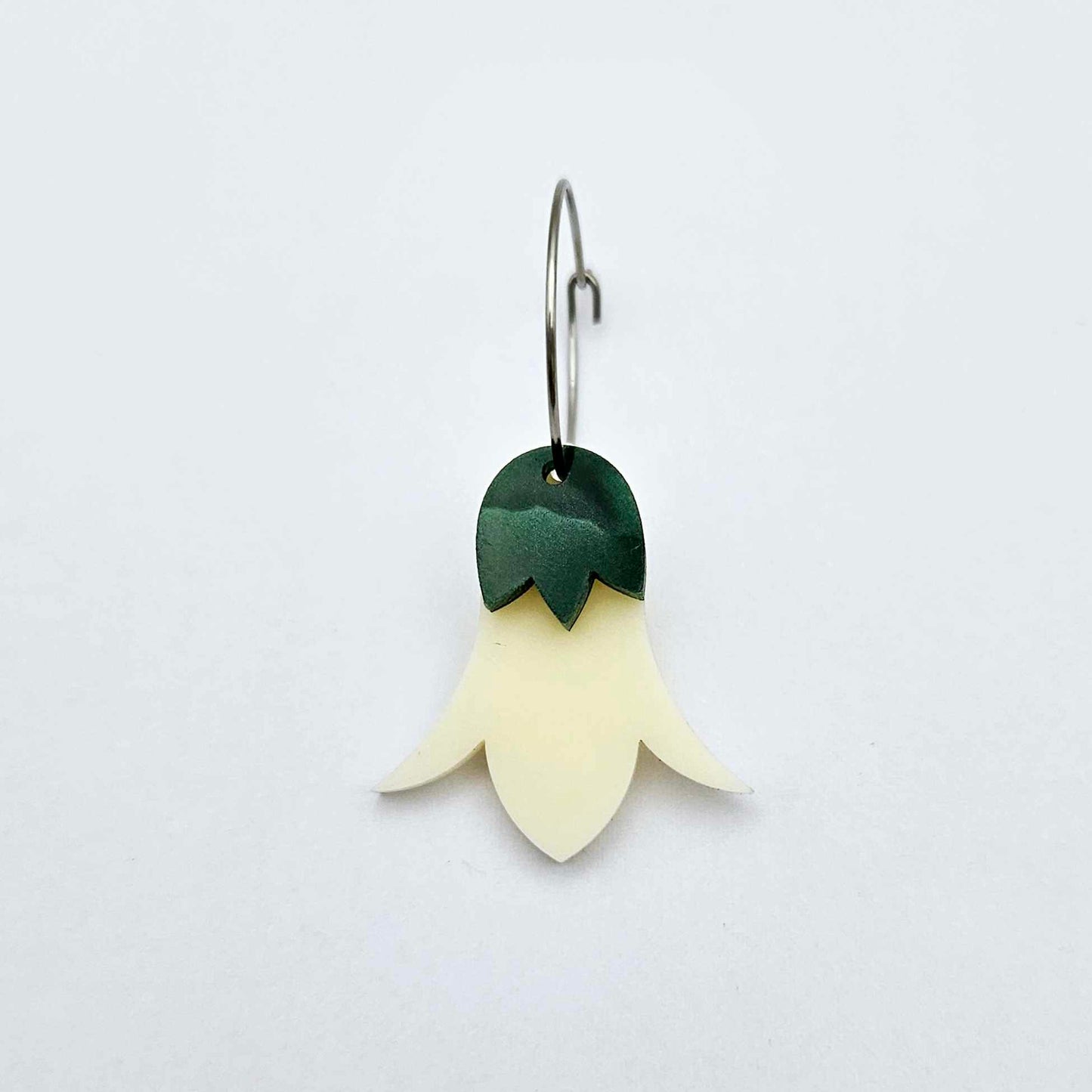 Cream acrylic nodding flower dangle blanks assembled on 20mm hoops with leaf cap detail for a layered botanical flower look