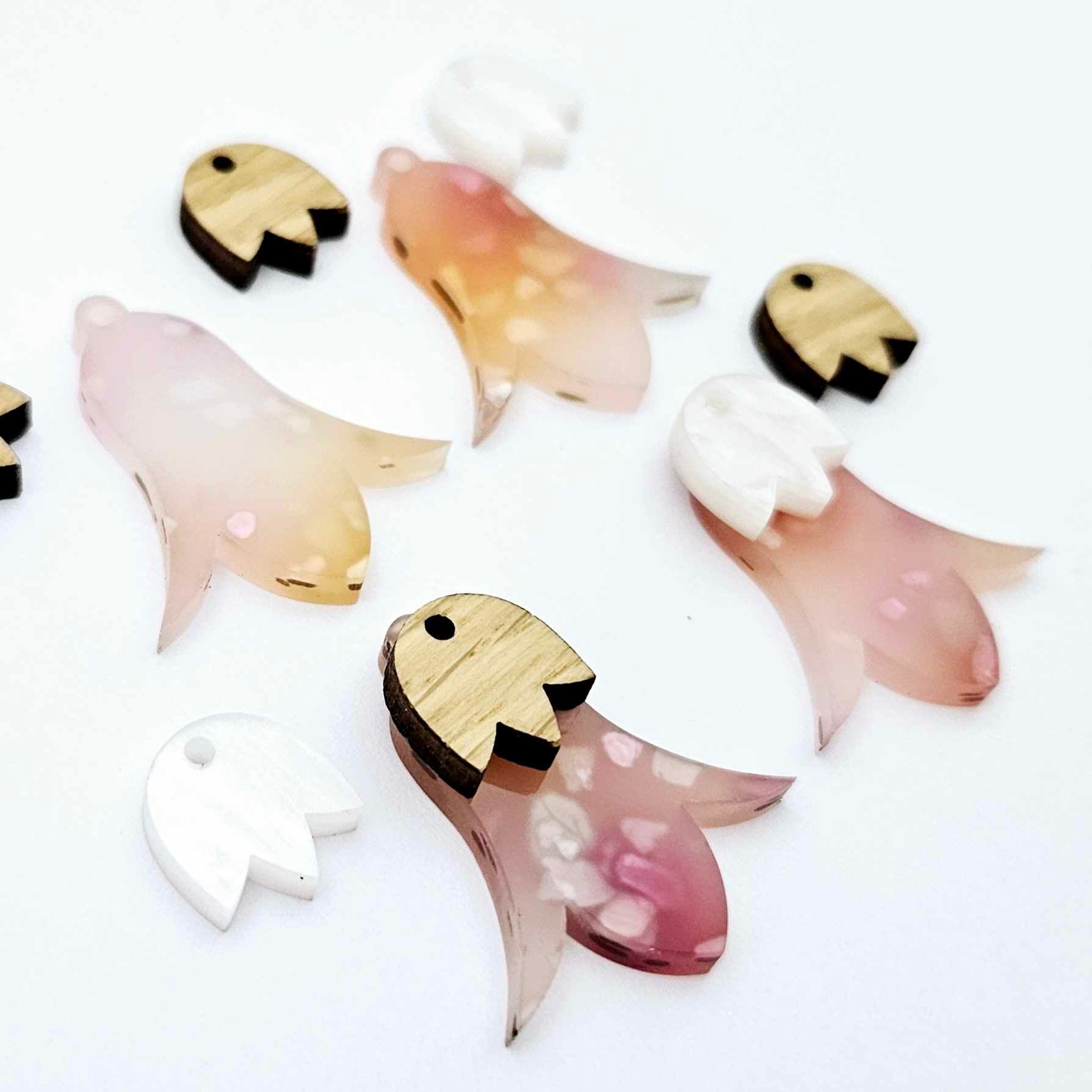 28mm frangipani petal acrylic nodding flower dangle blanks shown on their own and with oak wood and white marble leaf cap pieces