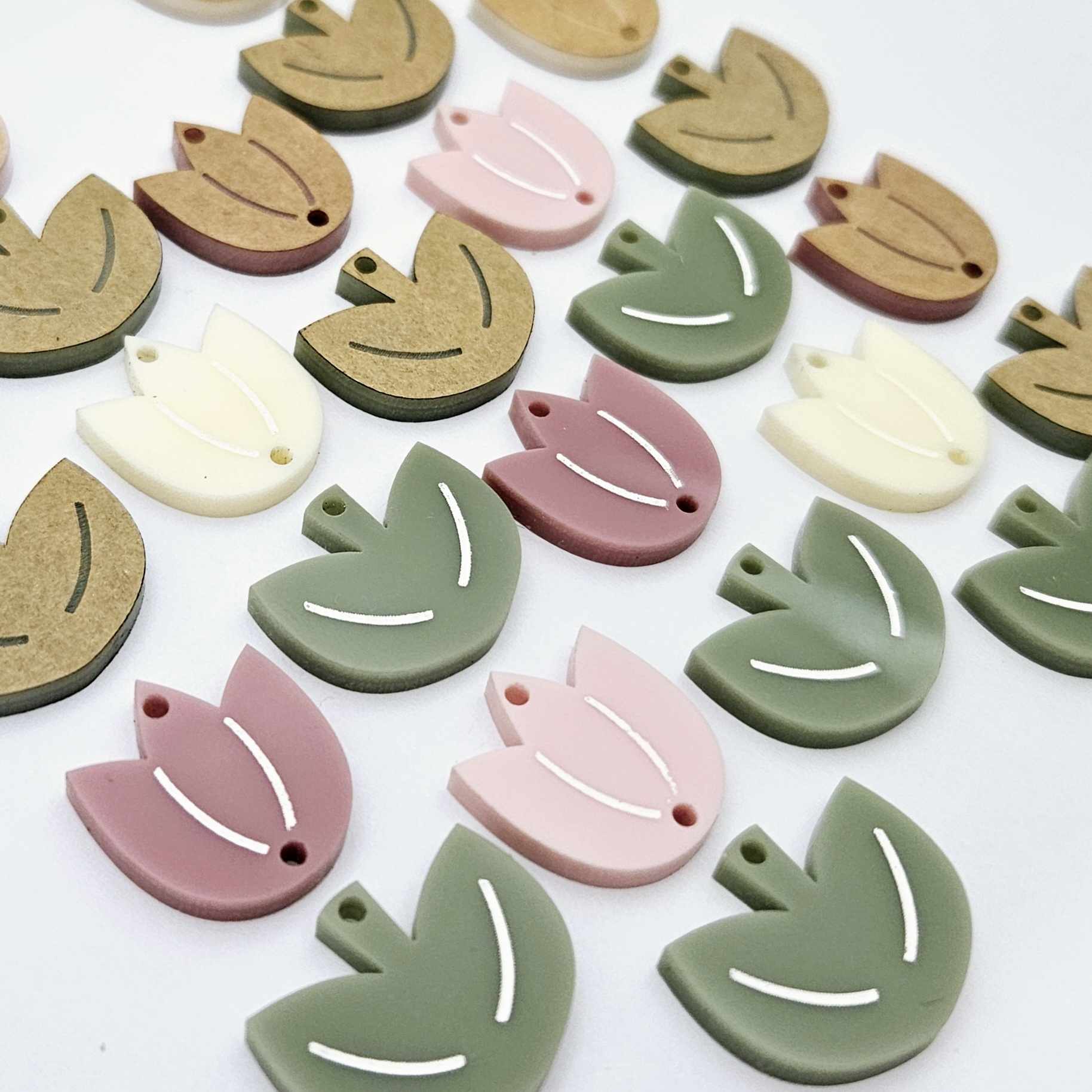 Two-piece tulip acrylic dangle blanks in a mixed pack of solid colours and olive green, paint filled white on some and remaining unfilled