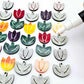 Two-piece tulip acrylic dangle blanks in marble and green mineral acrylic mixed pack, paint filled white on some with remaining unfilled