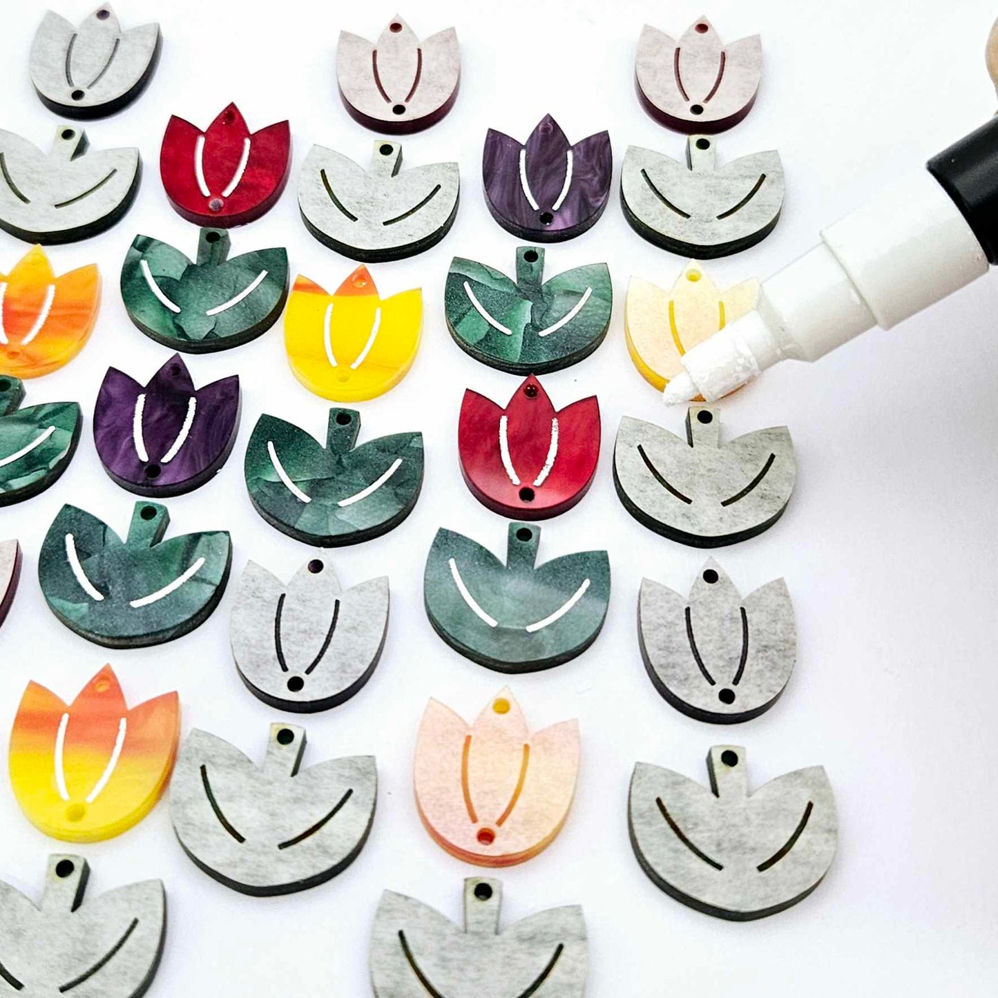 Two-piece tulip acrylic dangle blanks in marble and green mineral acrylic mixed pack, paint filled white on some with remaining unfilled