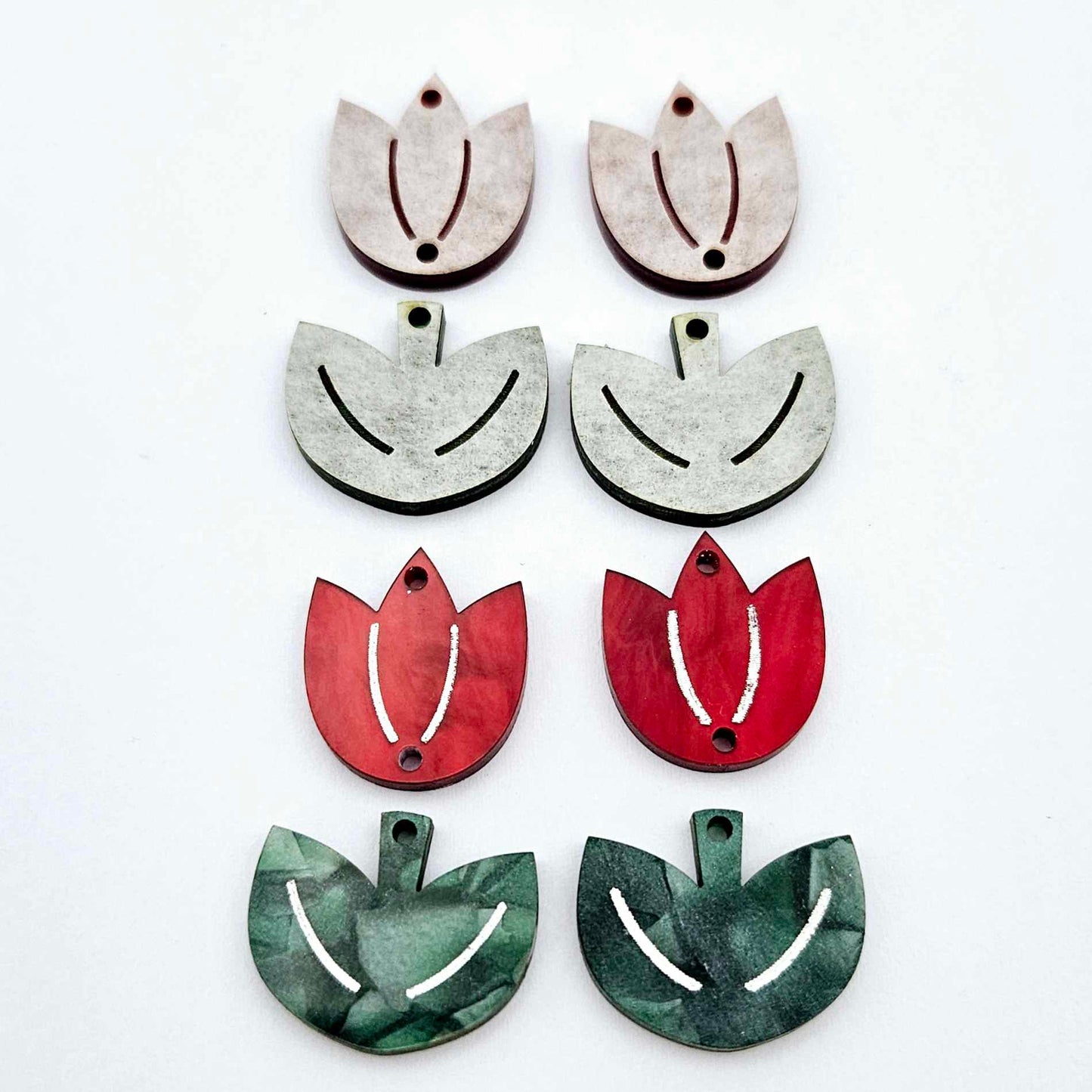 Two-piece tulip acrylic dangle blanks in red marble and green mineral acrylic, paint filled white on one pair with remaining pair unfilled