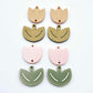 Dusty pale pink and olive green acrylic tulip dangle blanks, one pair paint filled white and one pair with protective paper on, shown as a two-piece floral design