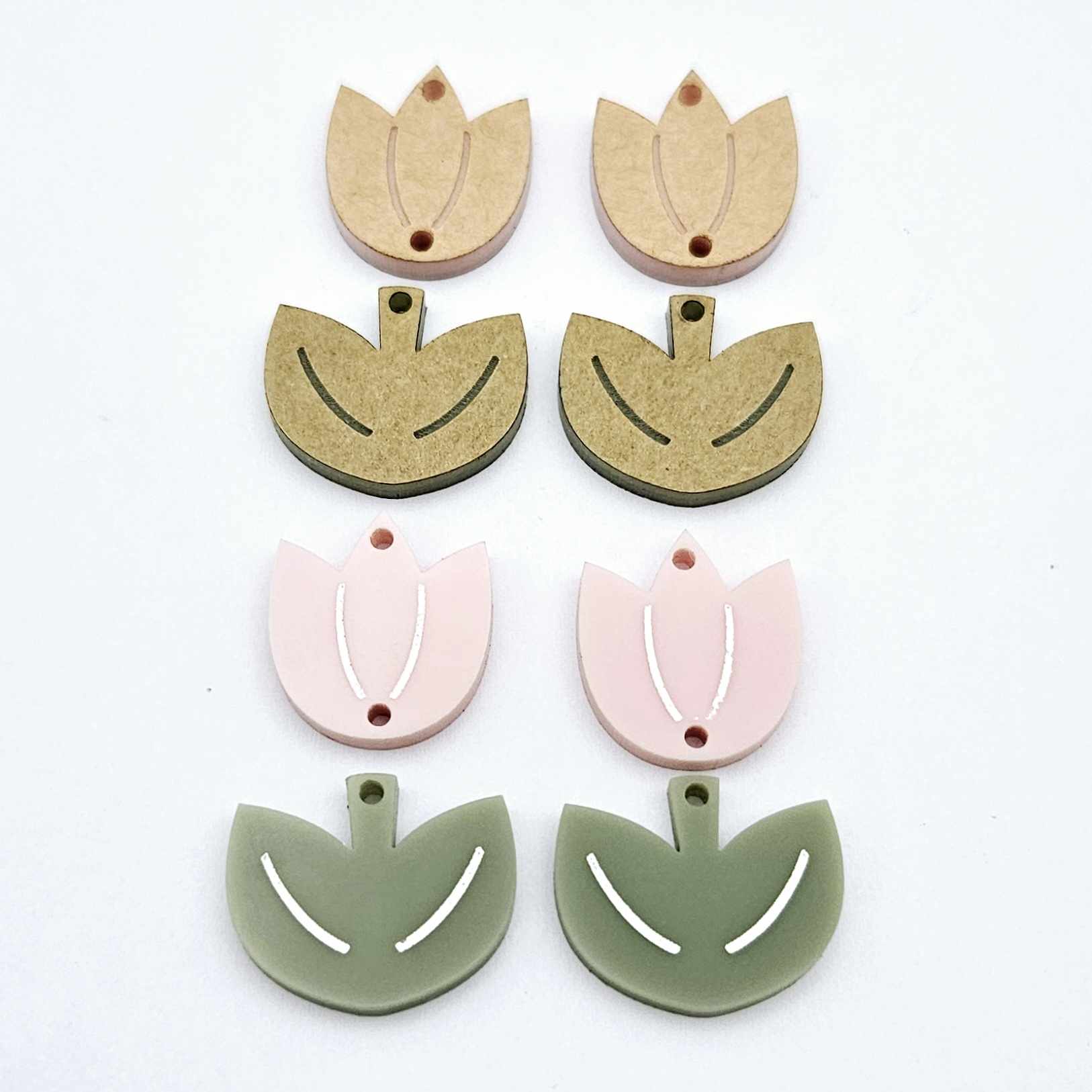 Dusty pale pink and olive green acrylic tulip dangle blanks, one pair paint filled white and one pair with protective paper on, shown as a two-piece floral design