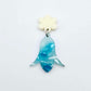 28mm periwinkle petal acrylic nodding flower dangle hanging from a 14mm flower topper, shown as a completed earring design