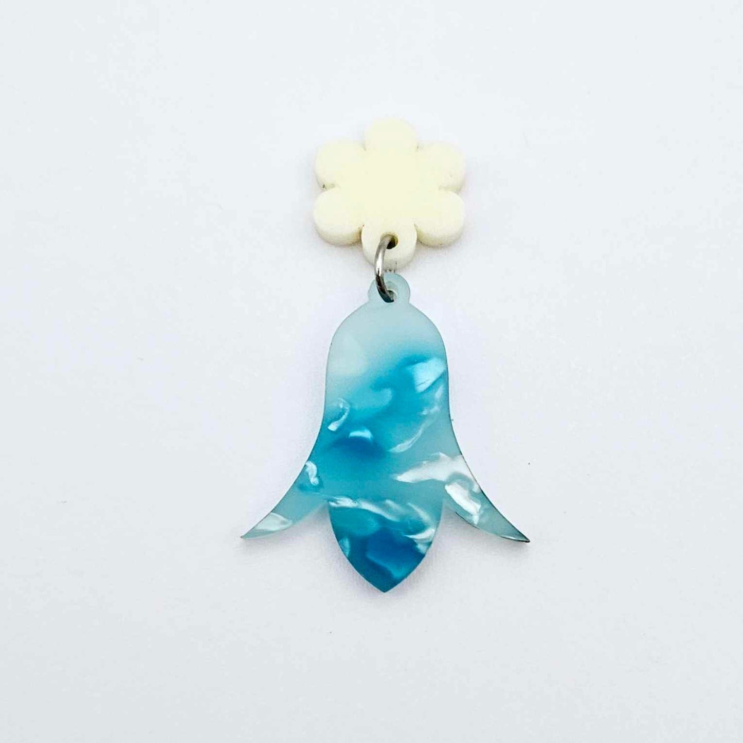 28mm periwinkle petal acrylic nodding flower dangle hanging from a 14mm flower topper, shown as a completed earring design