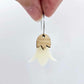 Cream acrylic nodding flower dangle blanks assembled on 20mm hoops with leaf cap detail for a layered botanical flower look