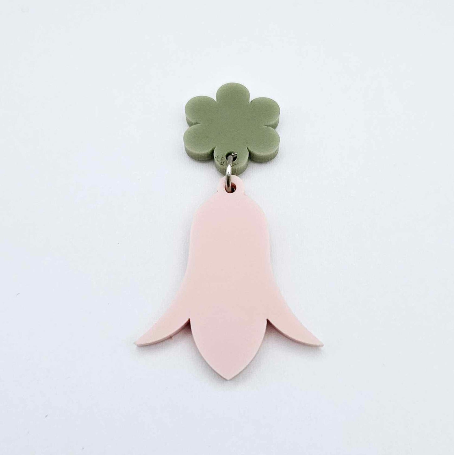 28mm dusty pale pink nodding flower dangle hanging from a 14mm flower topper, shown as a completed earring design