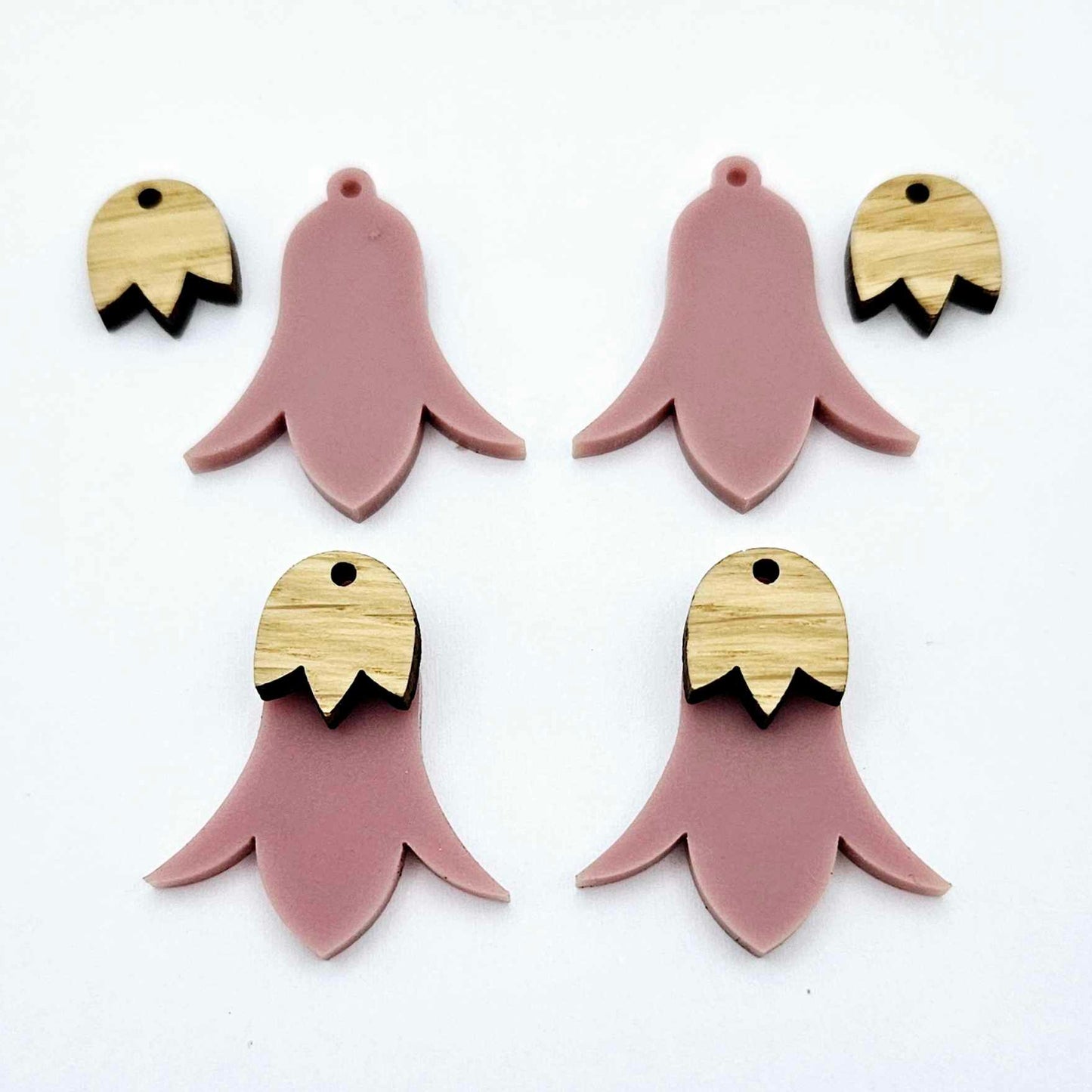 28mm dusty rose acrylic nodding flower dangle blanks shown on their own and with oak wood leaf cap pieces